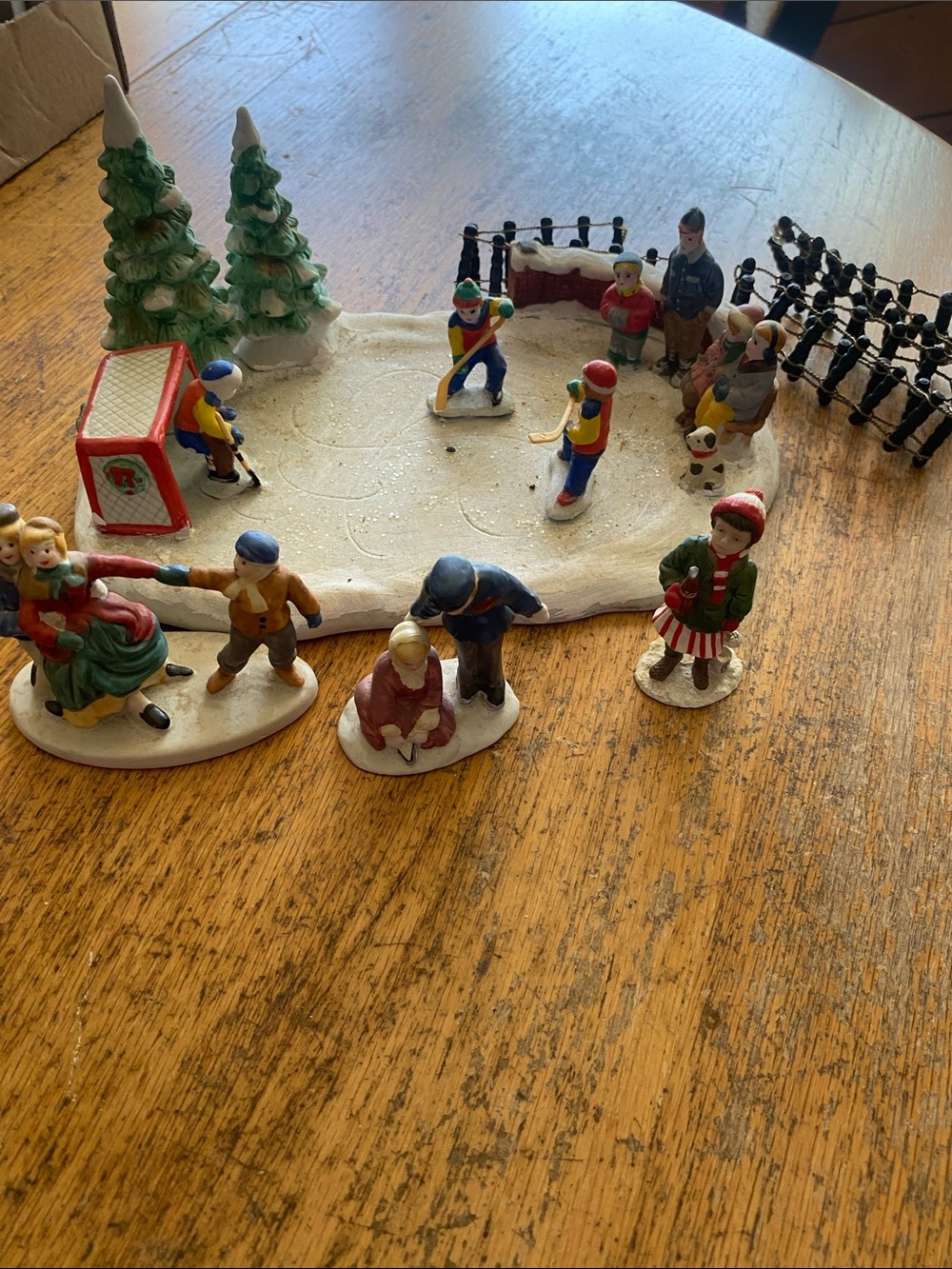 Lemax Holiday Ice Rink Village Set with Colorful Figurines